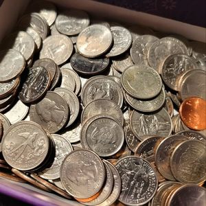 Box of rare U.S. State and non state quarters and error quarters.